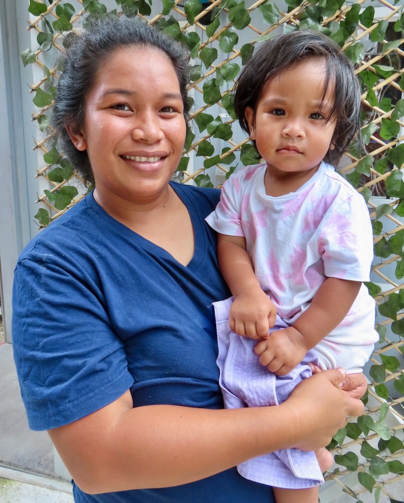 Cindrea with her baby daughter